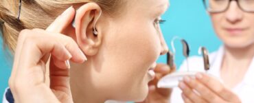 how to put in a hearing aid